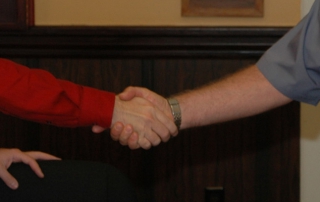 two men shaking hands