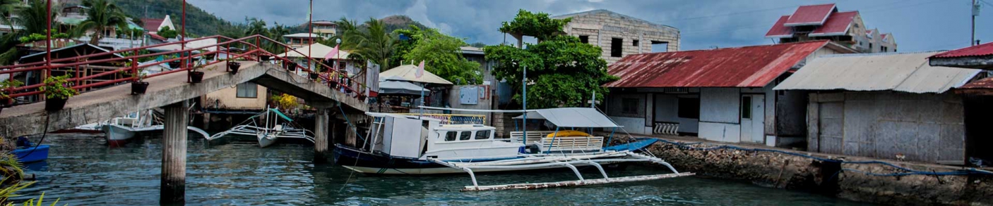 Asian waterfront town and boats