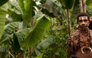 Simbari Man standing in the jungle