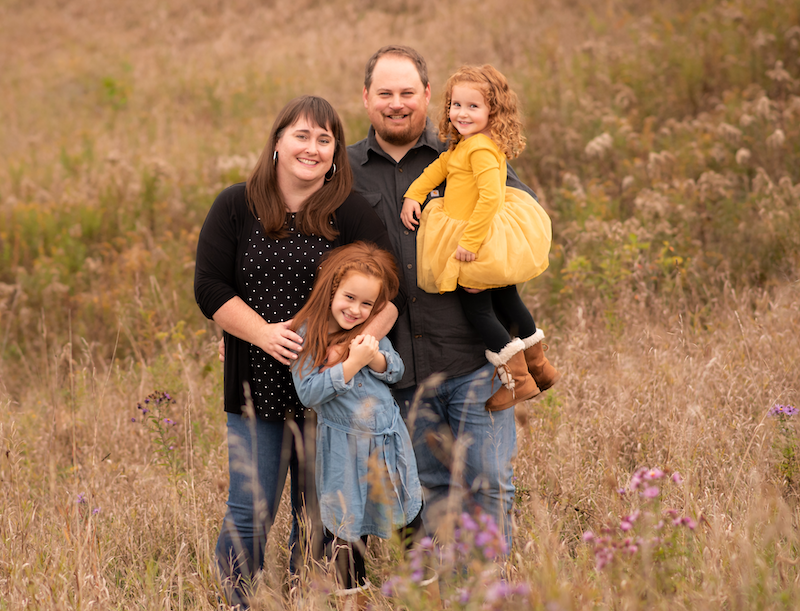 Pete and Carly Nichols with their children