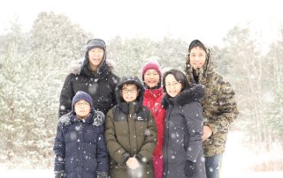 Peter and Elaine Yoon with their children