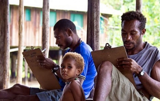 PNG men studying