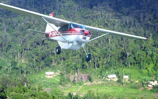 plane over Indo village