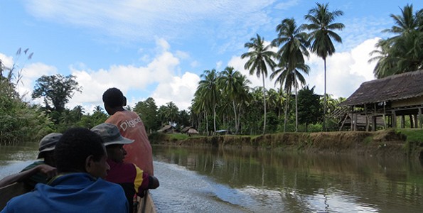 men travel down river