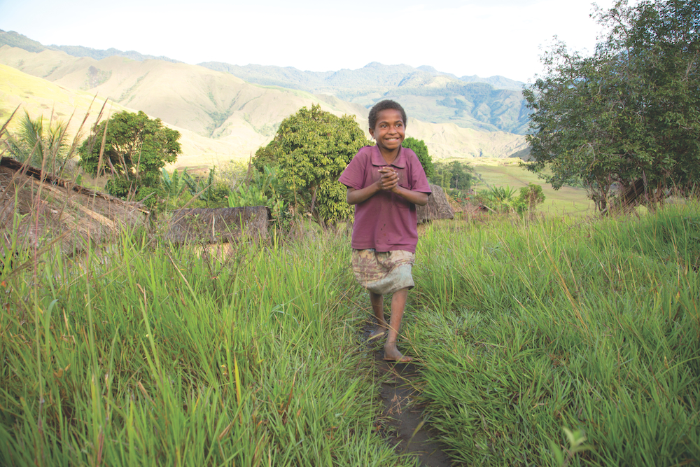 young boy walking trails