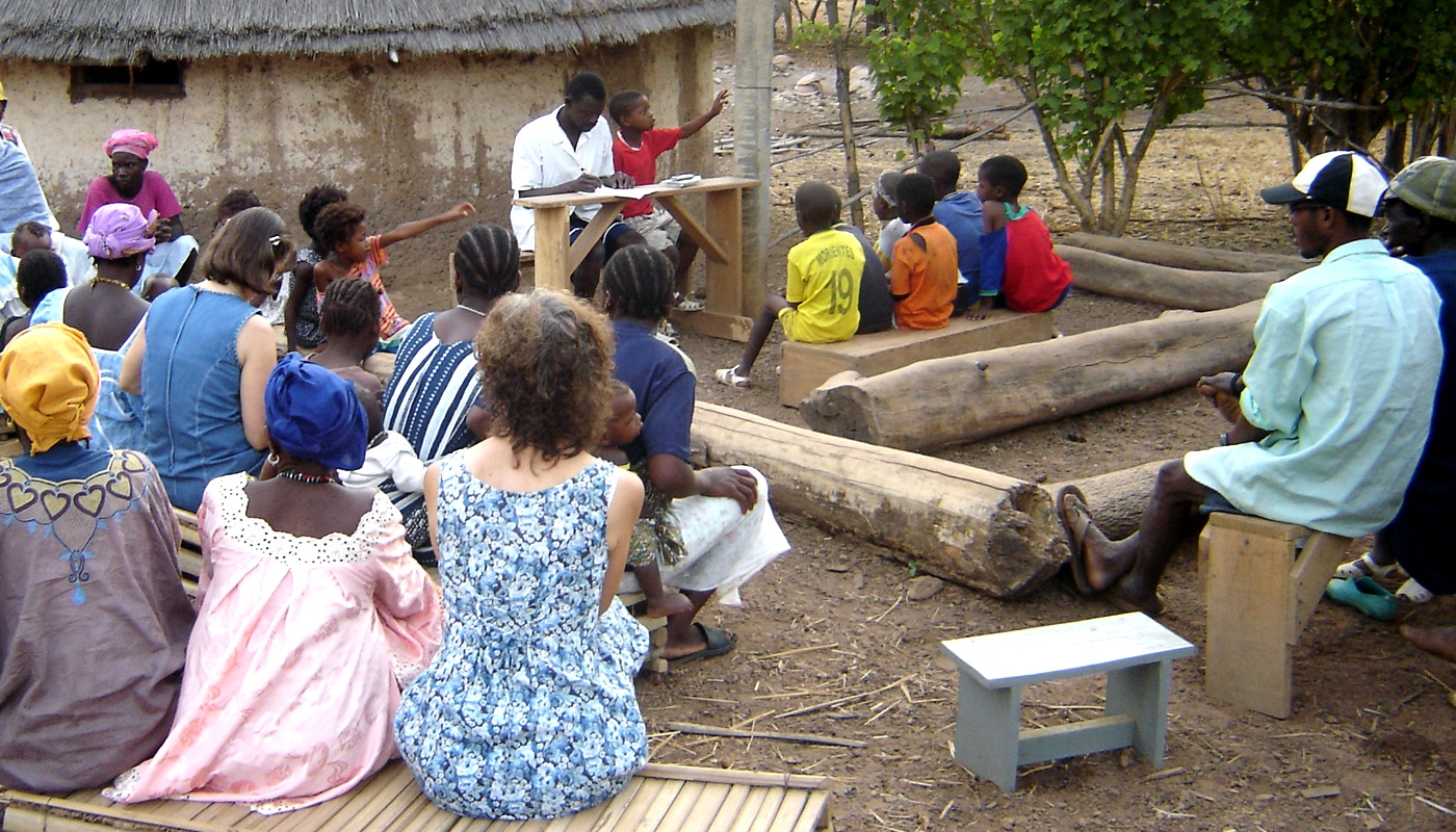 Budik teacher Pityan shares a Bible lesson with Budik believers.