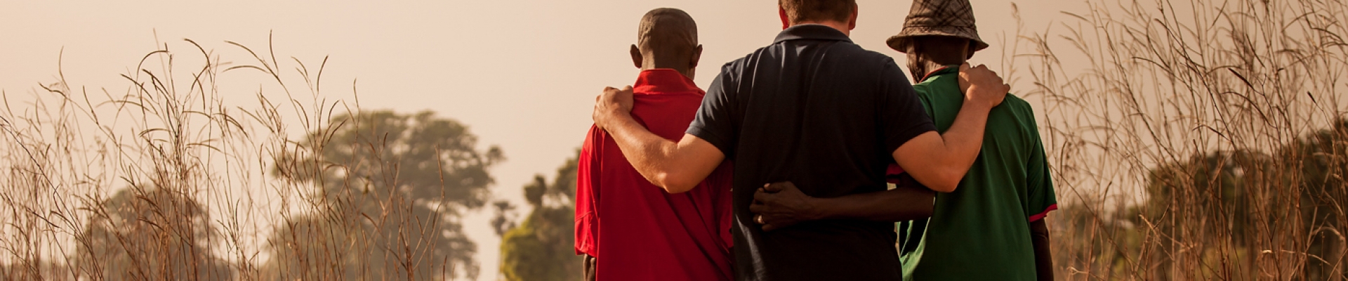 three men walking together