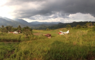 plane and helicopter over PNG