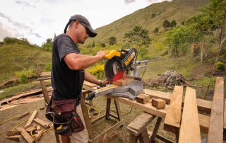 Man operating saw