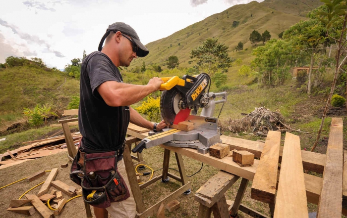 Man operating saw