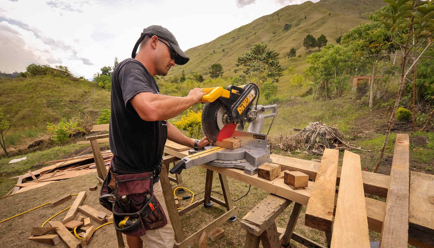 Man operating saw