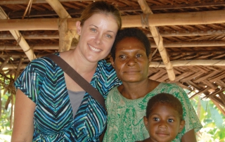 Papua New Guinea Missionary with woman and child