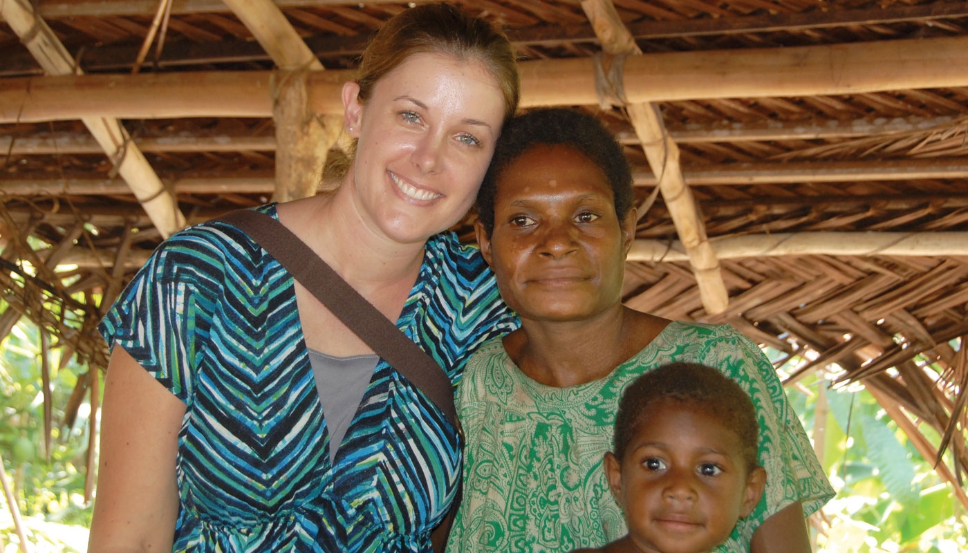 Papua New Guinea Missionary with woman and child