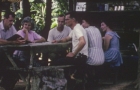 Missionaries sitting at table