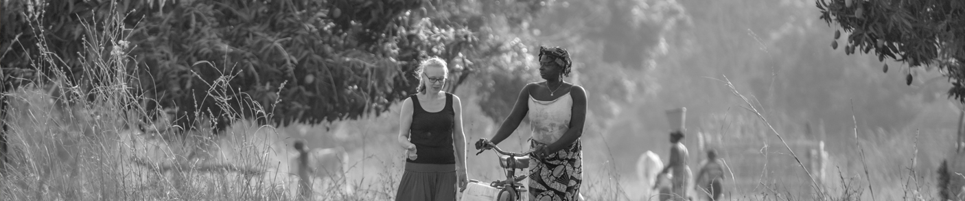 two ladies and a bicycle