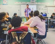 students in classroom with teacher