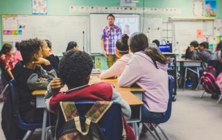 students in classroom with teacher