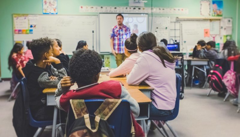 students in classroom with teacher