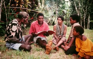 group of peopel studying the Bible