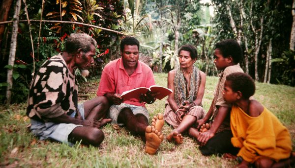 group of peopel studying the Bible