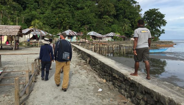 missionaries walking into a village on Kurudu