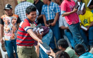 Paraguayan man hands out new Bibles