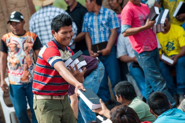 Paraguayan man hands out new Bibles