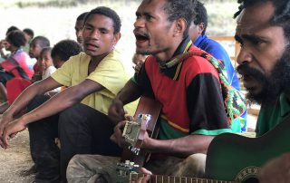 men from Papua New Guinea praising God