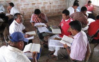 Colombian men studying the Bible