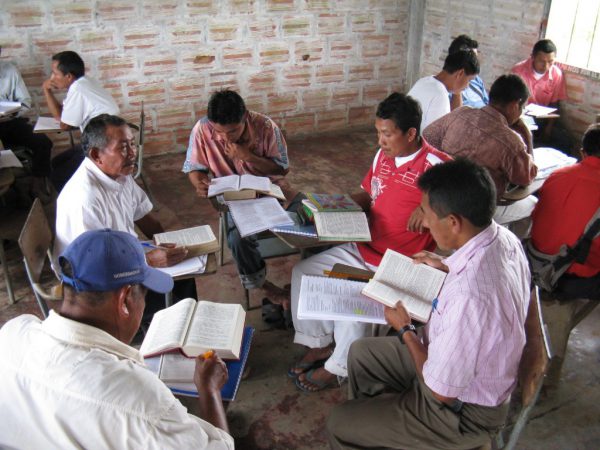 Colombian men studying the Bible