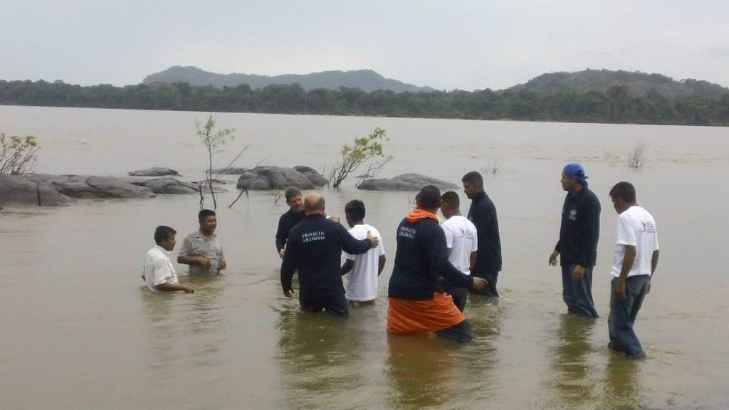 Guahibo believers being baptized in a river