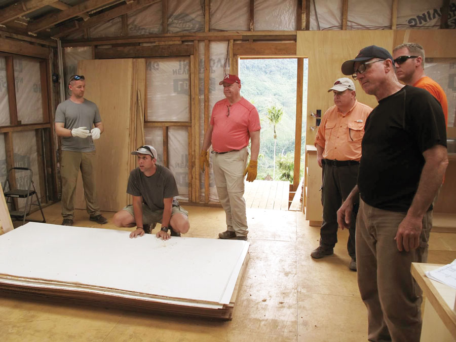 workteam helping Jeremy build their house in the village