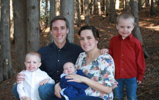 Christian, Megan and their 3 children in the woods