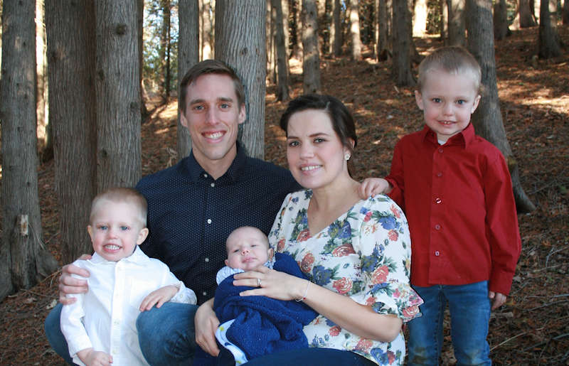 Christian, Megan and their 3 children in the woods