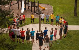 students gathered in a circle at Wayumi retreat