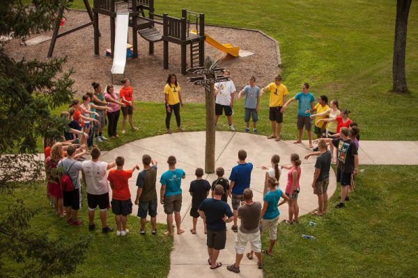 students gathered in a circle at Wayumi retreat