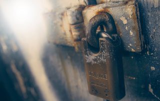 a heavy padlock securing a door