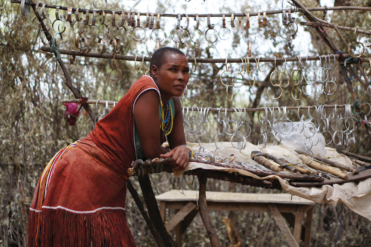 Tanzanian woman selling bracelets