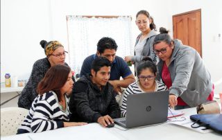 Jenny (right), Silvana (top) and other missionaries attend a literacy workshop