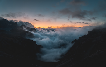 cloud-choked mountains in Italy