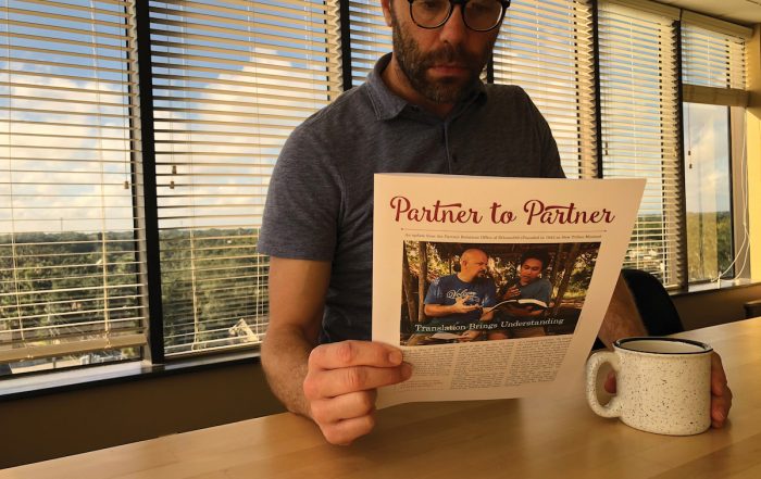 man reading Partner to Partner