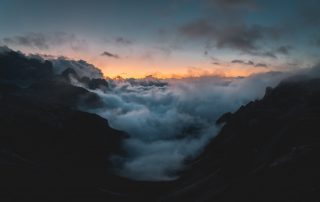 a cloud choked valley in Italy