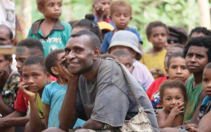 Kaje man smiling while at Bible teaching