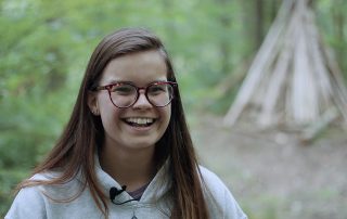 girl smiling, talking about Off the Grid