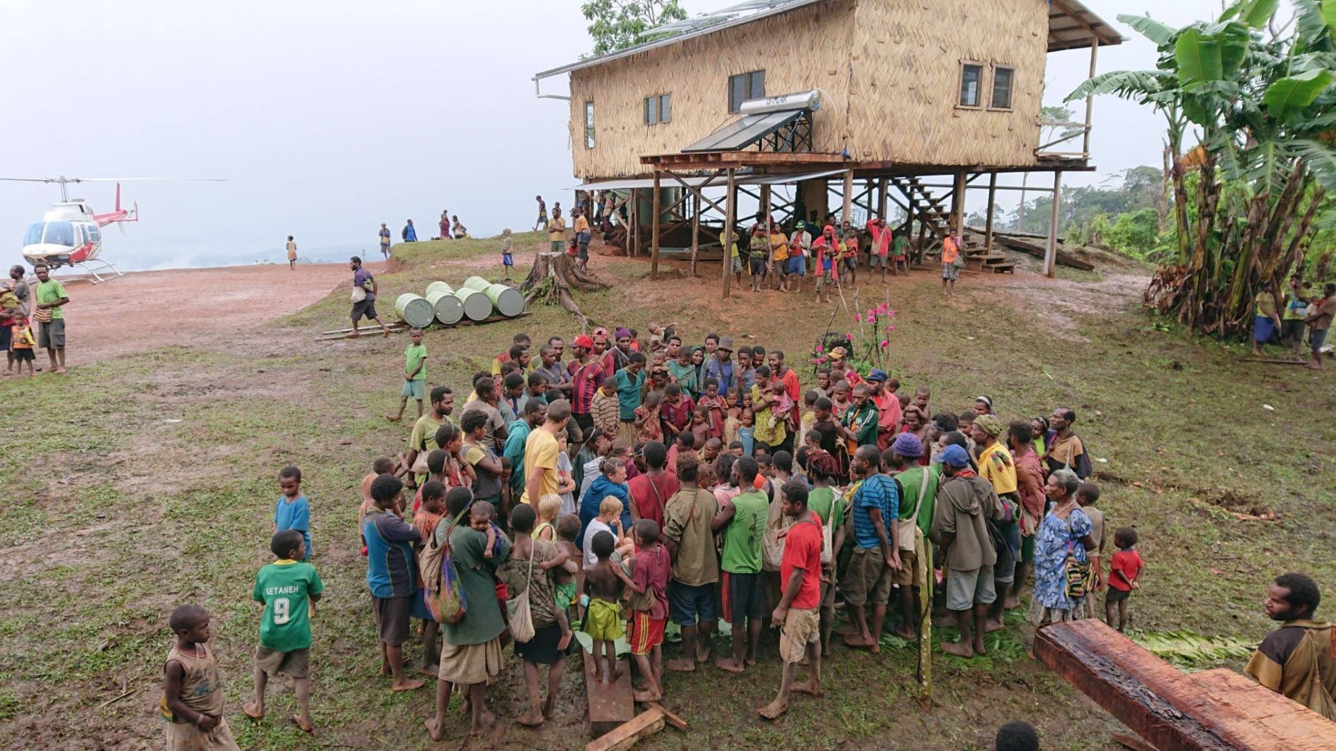 Kovol people gathering for the helicopter flight