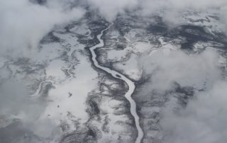 snowy terrain with river to stir thoughts of being lost