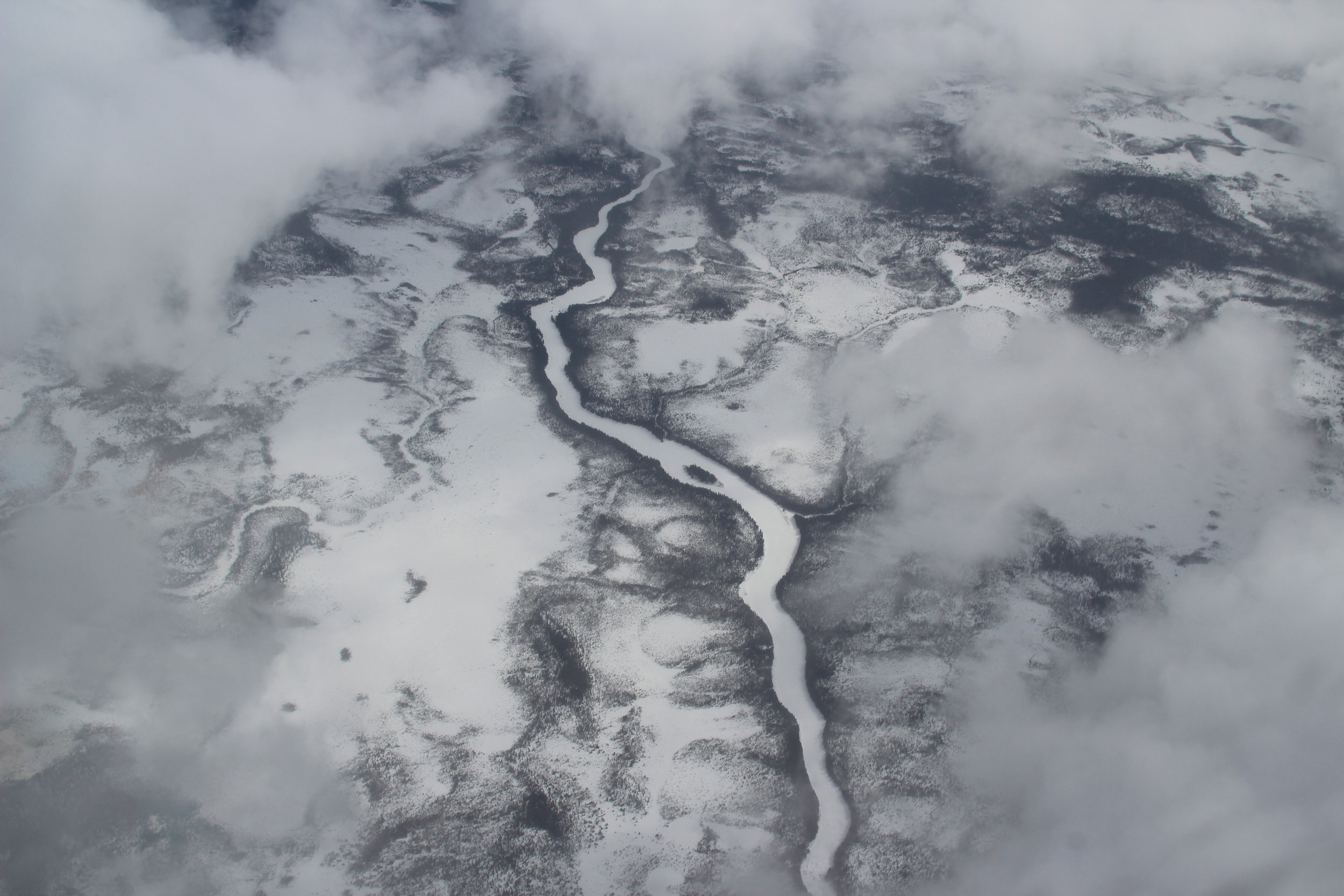 snowy terrain with river to stir thoughts of being lost