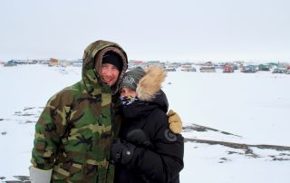 the Martins with a northern town in the background