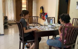 missionary studying language with language helper