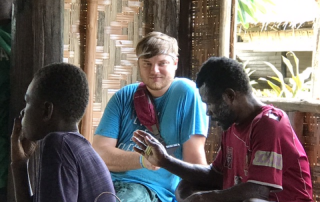 missionary in group with Anem people